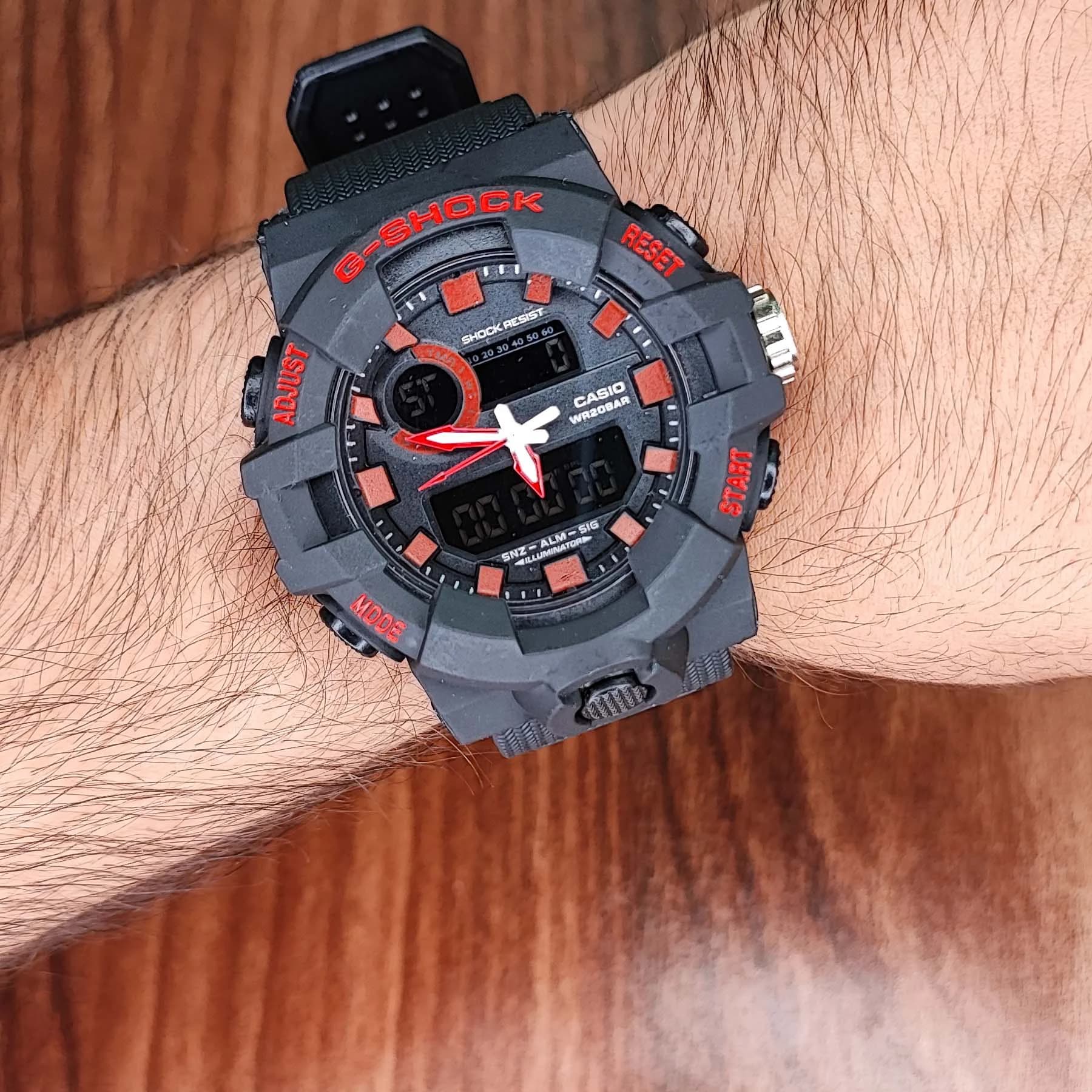 ساعت مچی عقربه‌ای مردانه دو زمانه جی شاک مشکی قرمز مدل GA-710GB