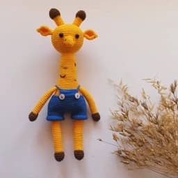 عروسک زرافه..قد حدود 35سانت. عروسک بافتنی.. دستبافت.. اسباب بازی — تصویر ۲