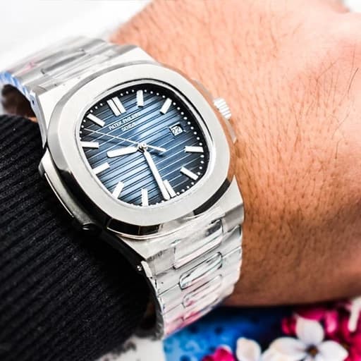 ساعت مچی مردانه پتک فیلیپ موتور ژاپن مدل ناتیلوس نقره ای سورمه ای (Patek Philippe Nautilus) — تصویر ۴