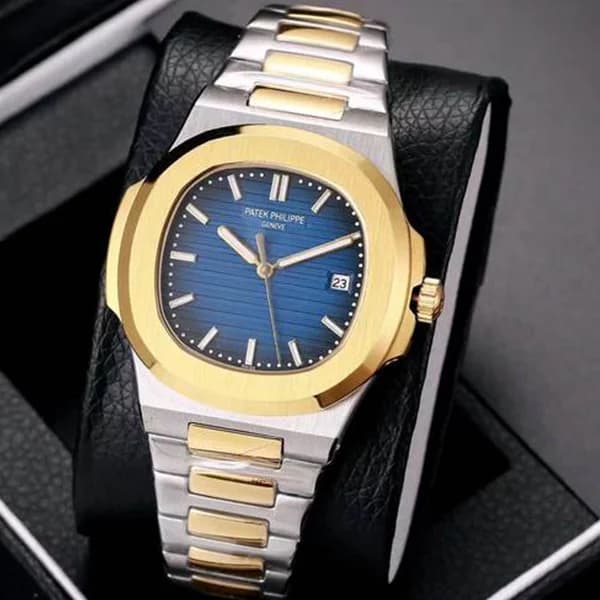 ساعت مچی مردانه پتک فیلیپ موتور ژاپن مدل ناتیلوس نقره ای طلایی سورمه ای (Patek Philippe Nautilus) — تصویر ۵