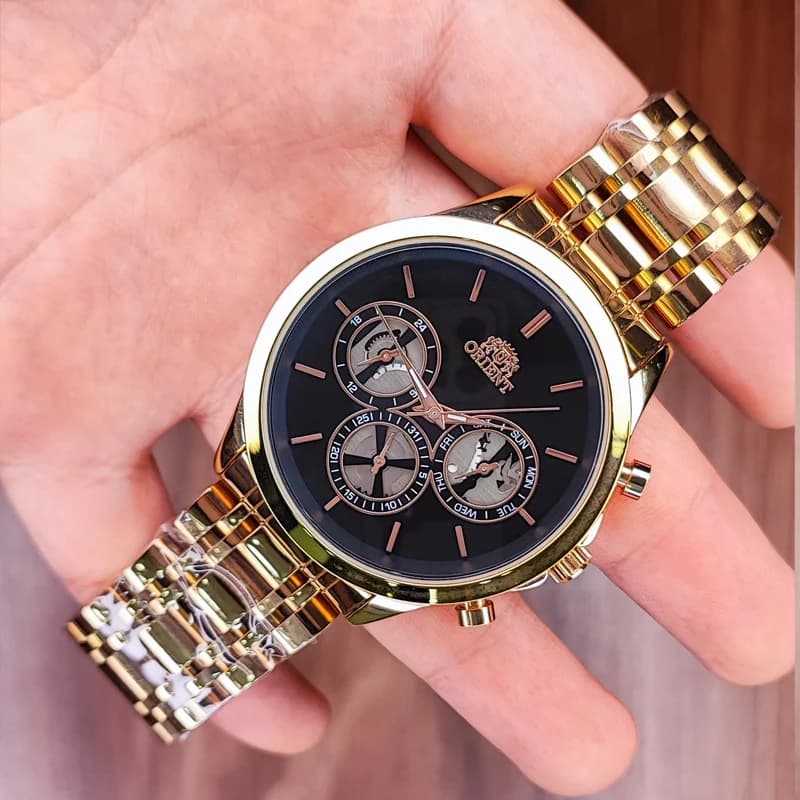 ساعت مچی عقربه ای مردانه اورینت مشکی رزگلد مدل 9364G
