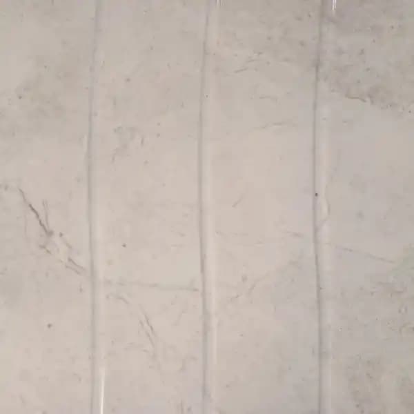 سرامیک دیوار الگا طرح لئون ابزارخورده برندOLGAZENTO