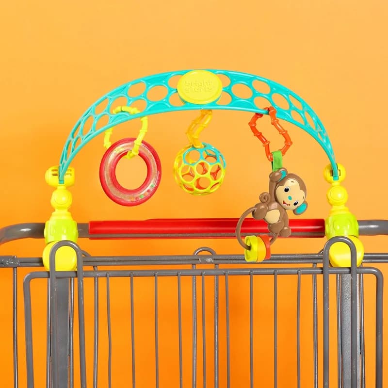 آویز بازی Bright Starts OBall Flex ‘n Go برای کالسکه یا کریر — تصویر ۶