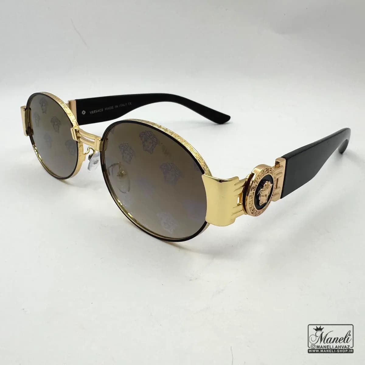 عینک UV برند versace با فریم طلایی و شیشه مشکی