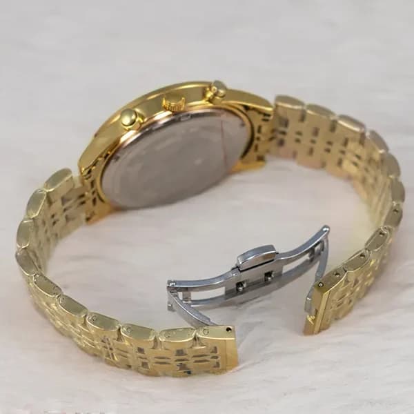 ساعت مچی عقربه ای مردانه اورینت سفید طلایی مدل 9365G — تصویر ۳