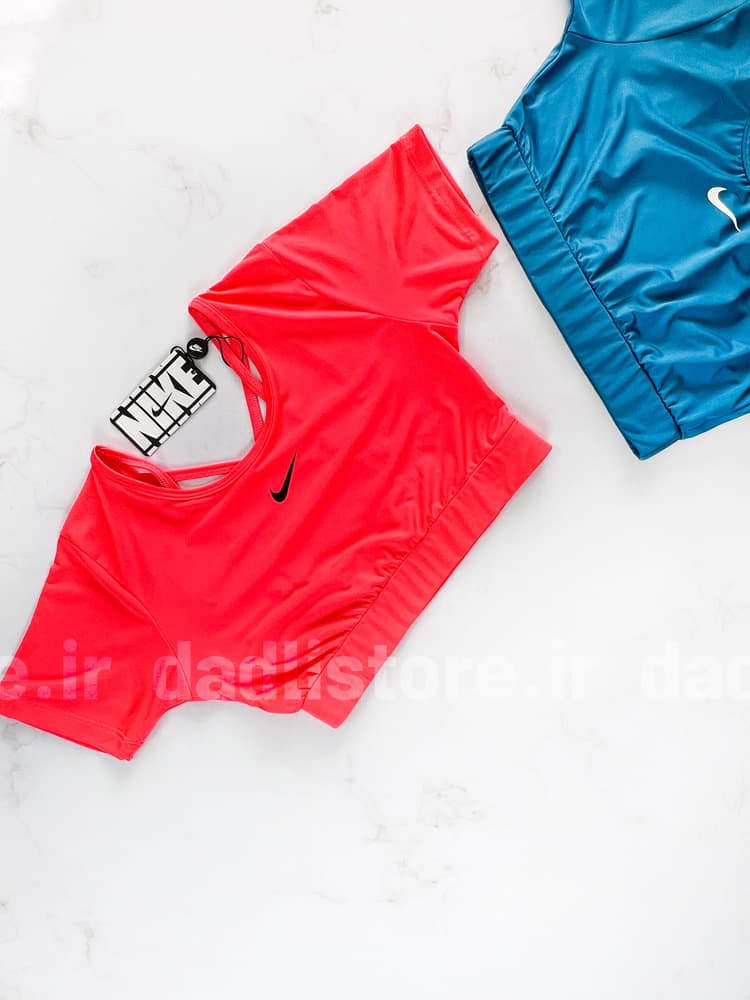 کراپ تاپ وزرشی زنانه فلامت آستین کوتاه پشت باز بندی نایکی Nike — تصویر ۷