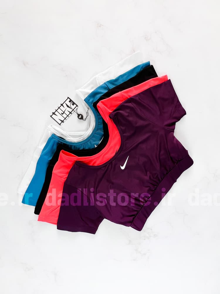 کراپ تاپ وزرشی زنانه فلامت آستین کوتاه پشت باز بندی نایکی Nike — تصویر ۳