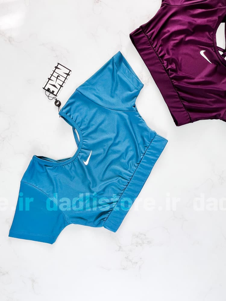 کراپ تاپ وزرشی زنانه فلامت آستین کوتاه پشت باز بندی نایکی Nike — تصویر ۵