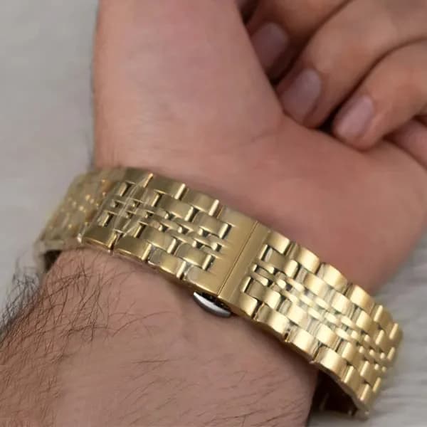 ساعت مچی عقربه ای مردانه اورینت مشکی طلایی مدل 9365G — تصویر ۳