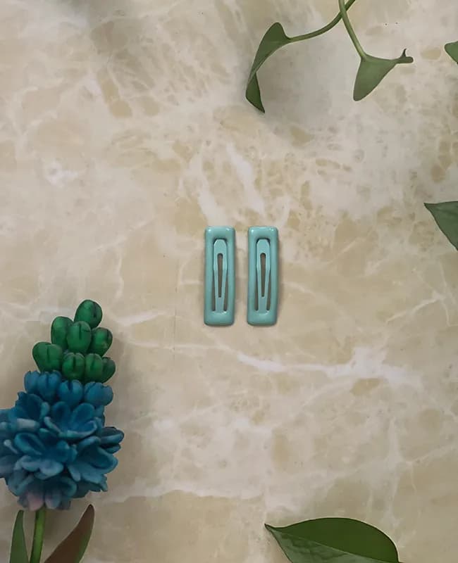 گیره مو تق تقی رنگ ابی اسمانی کد 40