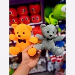 عروسک خرس کوچک قرمز نقلی (عمده 10 تایی) 18 سانتی — تصویر ۵