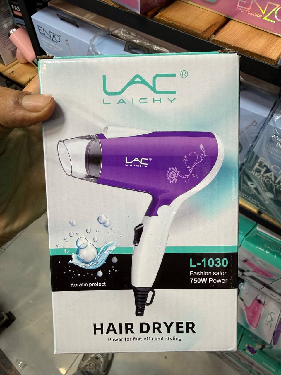 سشوار مسافرتی لایچی مدل LAC Laichy L-1030 توان ۷۵۰ وات با قابلیت یون و باد سرد اورجینال (عمده و تک) — تصویر ۵