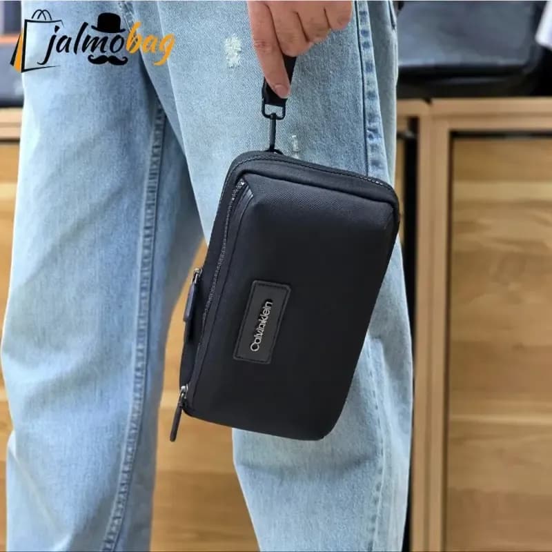 کیف دوشی و دستی اسپرت کلوین کلاین مدل 3 کاره برزنتی آبگریز — تصویر ۴