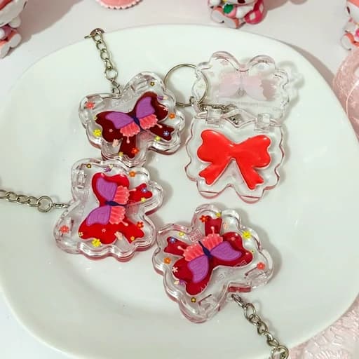 رژگونه و رژ لب سایه چشم صورتی گوگولی پروانه کیوت فانتزی پینترستی مناسب هدیه کادو دست کلید چارم بگ آویز کیف پرنسسی