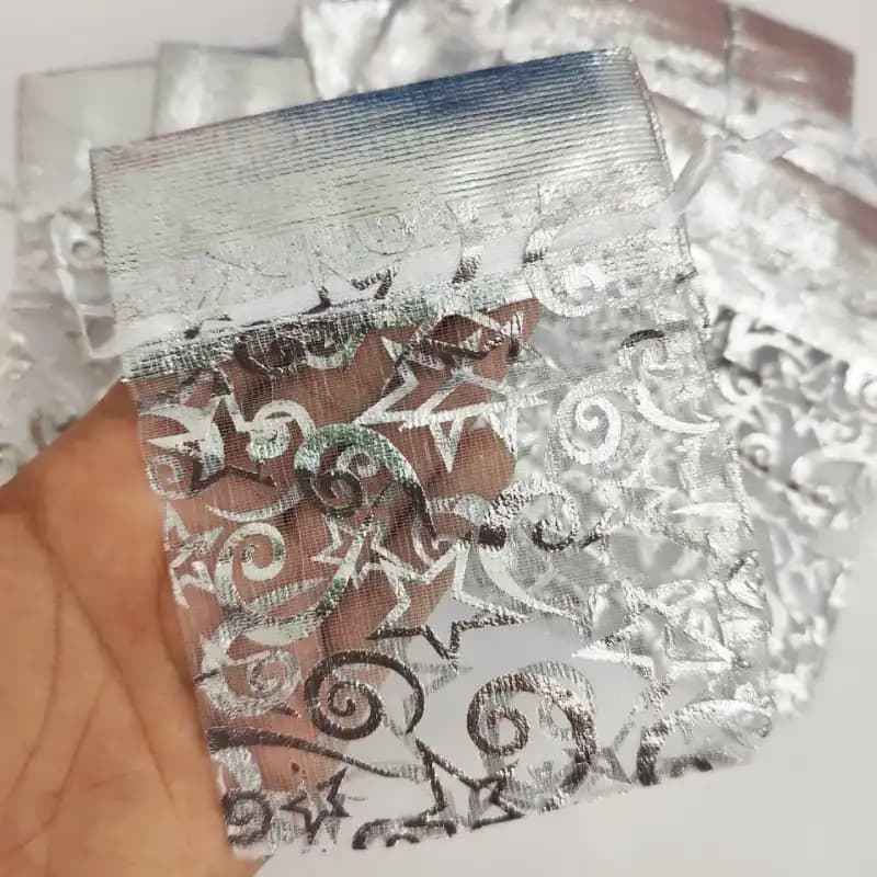 کیسه حریر طرحدار نقره ای ستاره ای سایز ۱۲ در ۸سانت(۱۰ عددی) — تصویر ۲