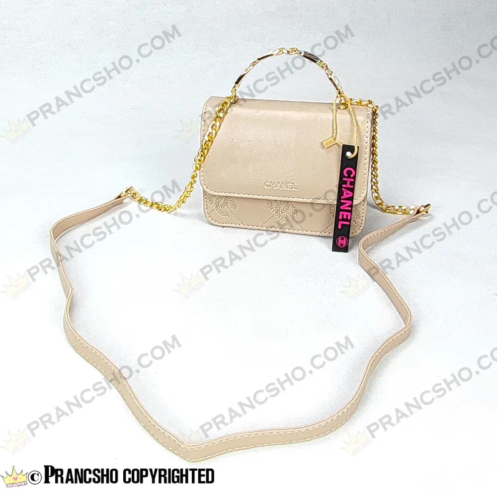 کیف پاسپورتی شنل (CHANEL) دسته فلزی طرح کوکو کرم پنککی — تصویر ۶