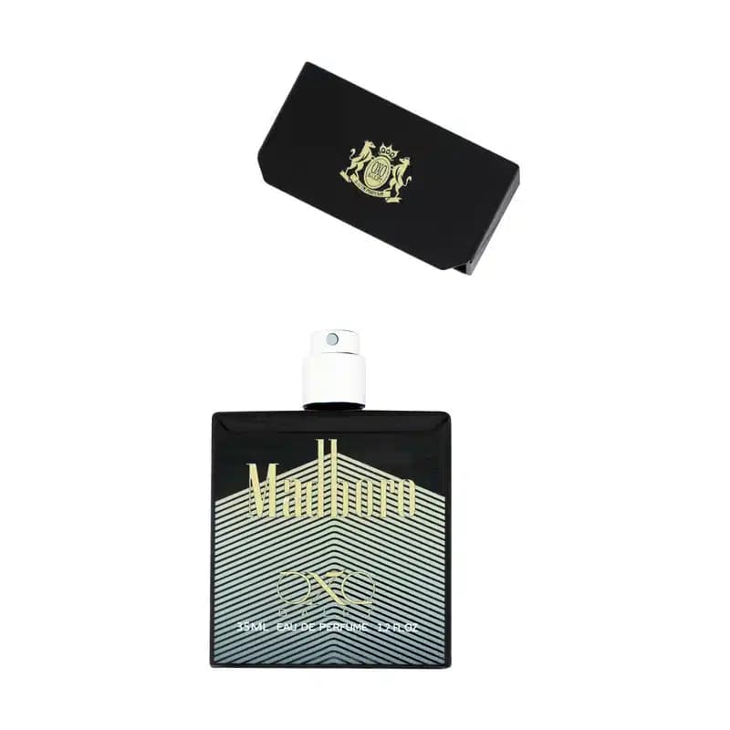 عطر جیبی اکس بالت مدل madboro touch gold کد (4631) — تصویر ۳
