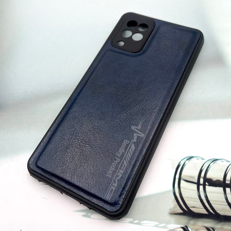 قاب گوشی Galaxy A12 / Galaxy M12 سامسونگ چرمی اورجینال کیس دور سیلیکونی AMG کلاسیک محافظ لنز دار سرمه ای کد 702571 — تصویر ۲