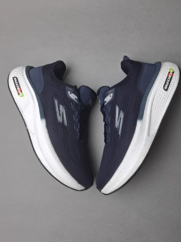 کتونی رانینگ و اسکیچرز زیره بامیکو (Skechers)مردانه وزنانه سرمه ای کد۱۱۷ — تصویر ۳