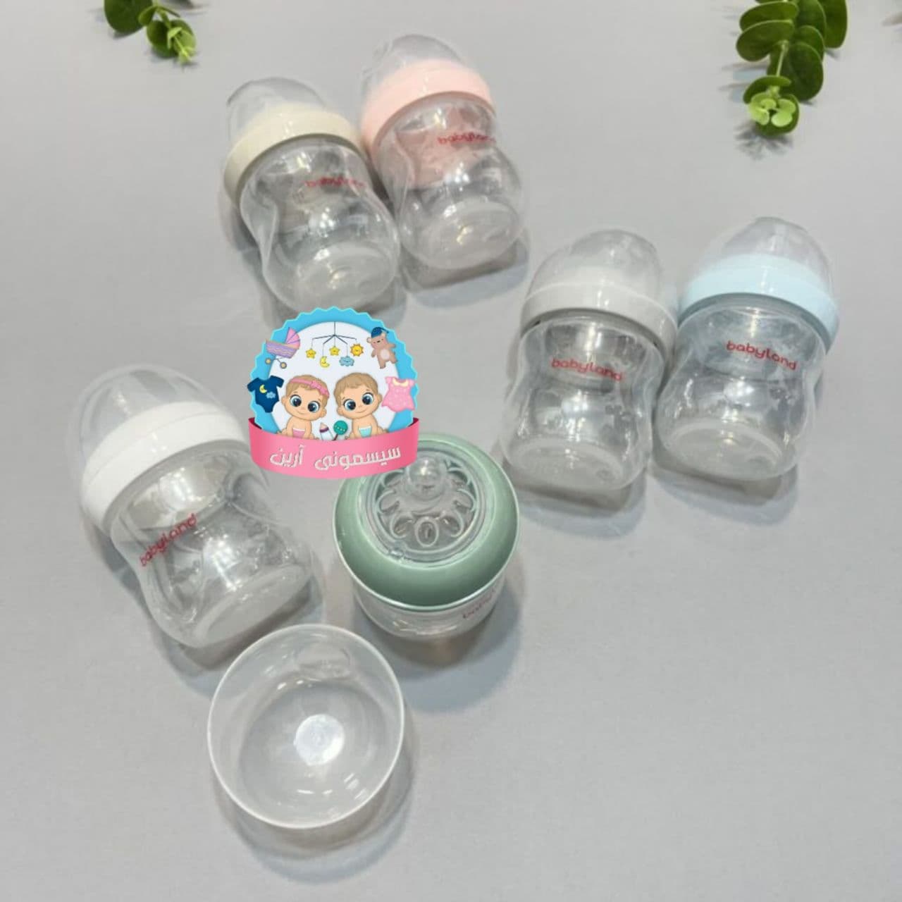شیشه شیر بیبی لند 125 میل طلقی طرح اونت نیم قطره کد 220 — تصویر ۲