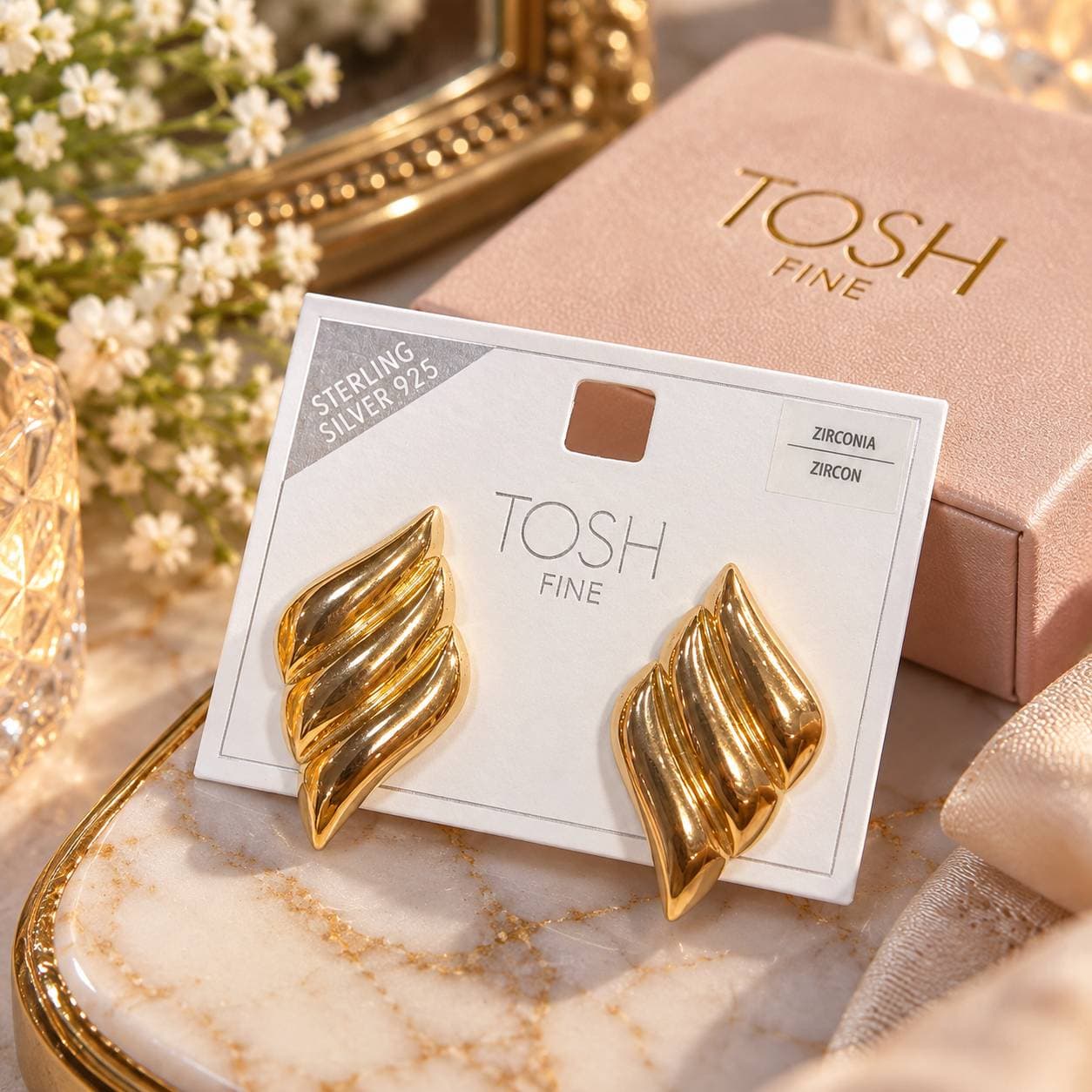 گوشواره زنانه طلایی مدل بال فرشته برند TOSH