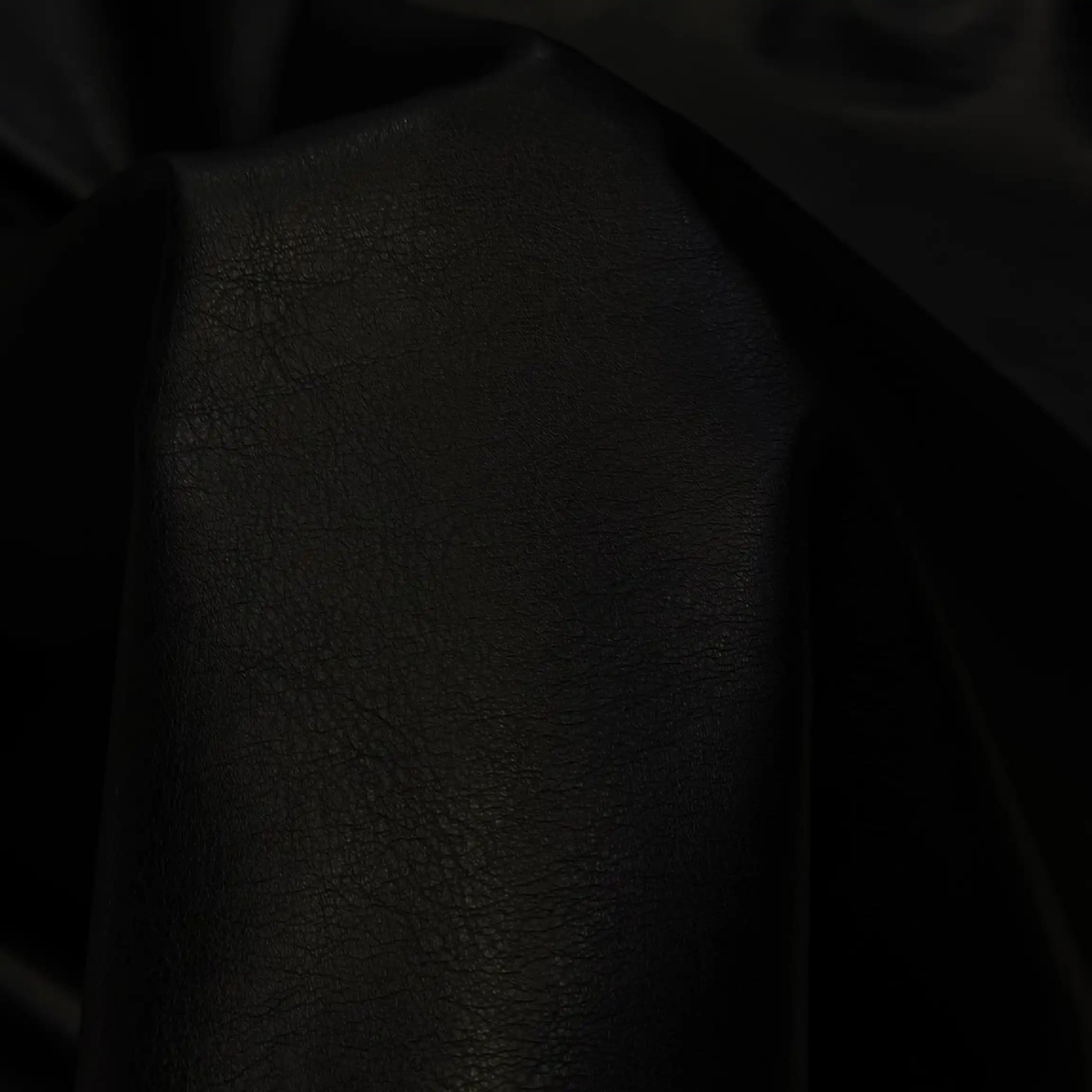 پارچه چرم پشت کتان مات رنگ مشکی — تصویر ۳