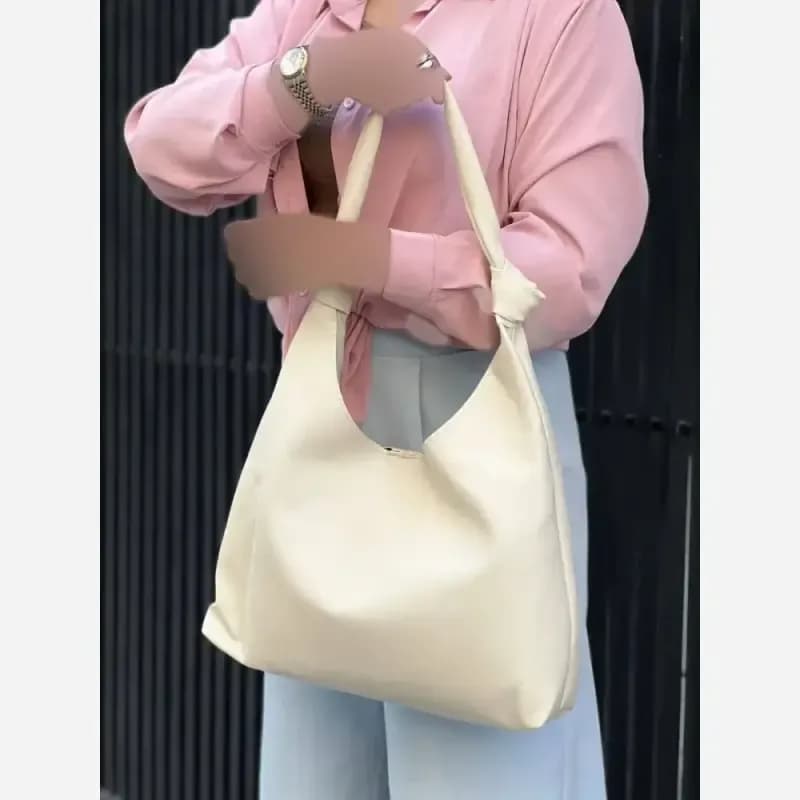 کیف زنانه شرانگ خارجی بند گره به همراه کیف آرایش سایز 33-38 — تصویر ۵