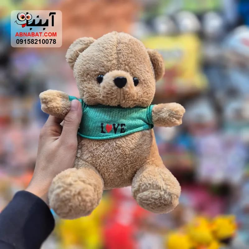 عروسک خرس لباسدار بنفش 30 سانتی کد 1525 — تصویر ۵