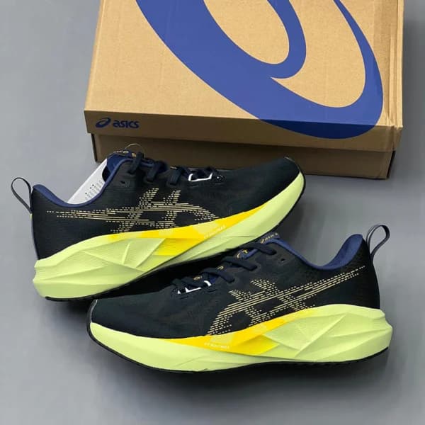 اسیکس نوابلاست 5 سرمه‌ای تیره زرد ASICS Novablast 5 Indigo Blue Amber