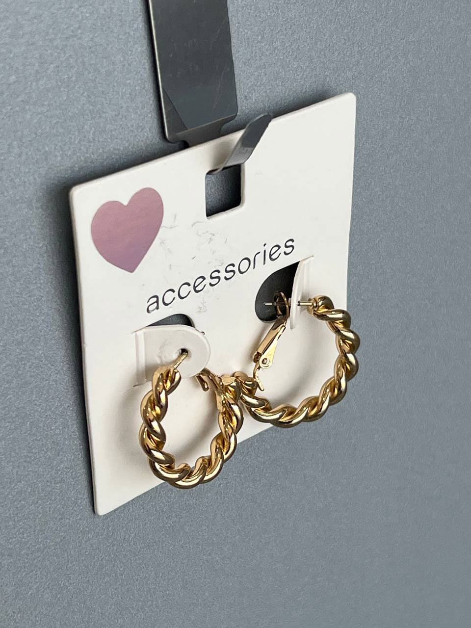 گوشواره پیچ‌ خورده طلایی – برند Accessories — تصویر ۲