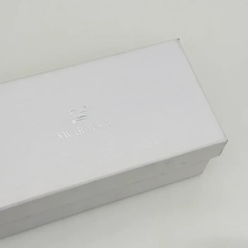 پک و قاب هارد عینک اورجینال سواروسکی Swarovski سفید صدفی با نشان قو — تصویر ۲