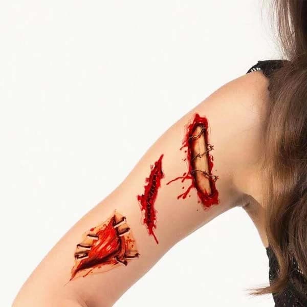 تتو موقت هالووینی طرح دنده مدل Bite برای جشنها — تصویر ۵