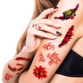 تتو موقت هالووینی طرح دنده مدل Bite برای جشنها — تصویر ۴