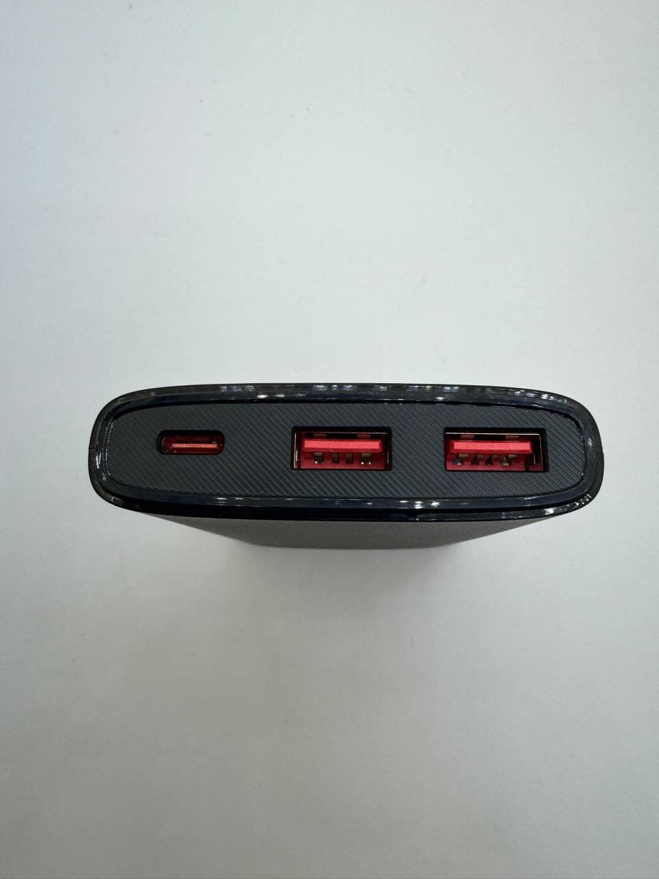 پاوربانک 10هزار مدل XC012 فست شارژ با توان 22.5 وات اصل — تصویر ۴