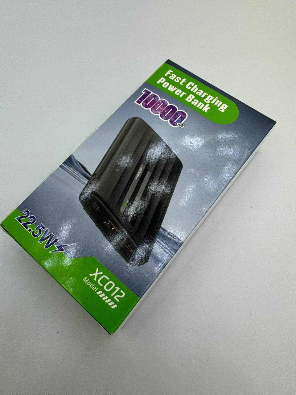 پاوربانک 10هزار مدل XC012 فست شارژ با توان 22.5 وات اصل — تصویر ۲