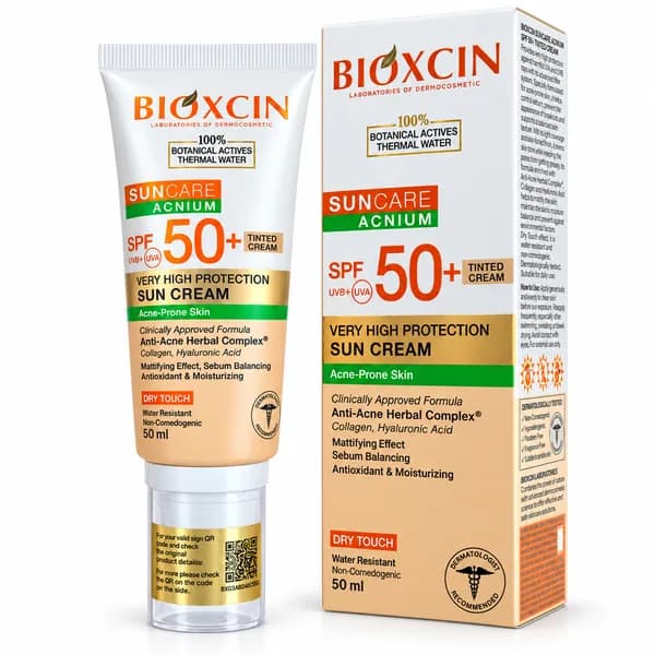 ضد آفتاب رنگی بیوکسین Sun Care Acnium SPF 50 مخصوص پوست مستعد آکنه حجم 50 میل