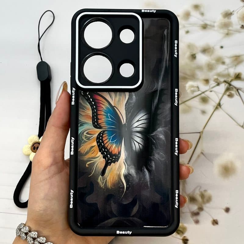 قاب گوشی Redmi Note 14S / Redmi Note 13 Pro 4G / Poco M6 Pro 4G شیائومی Strap Case سیلیکونی سولید ضد ضربه همراه بند مچی محافظ لنز دار طرح پروانه کد 666246