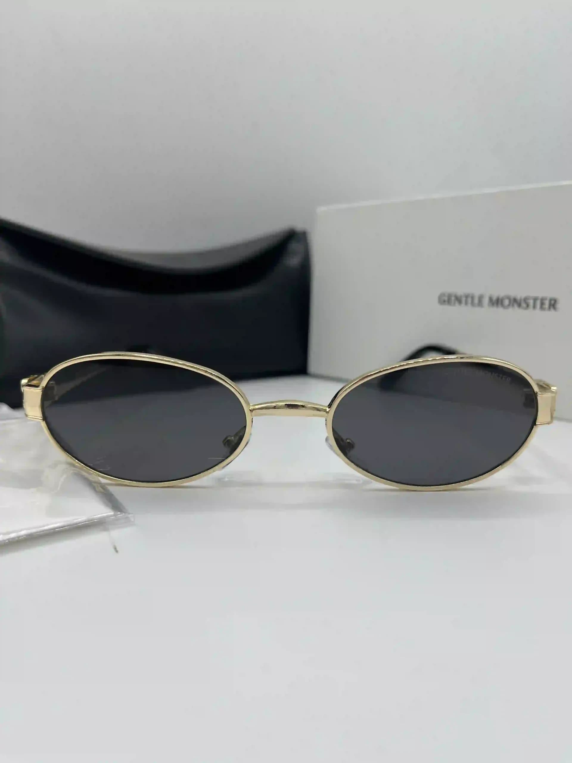 عینک آفتابی بیضی فلزی جنتل مانستر (Gentle Monster) با لنزهای رنگی — تصویر ۴