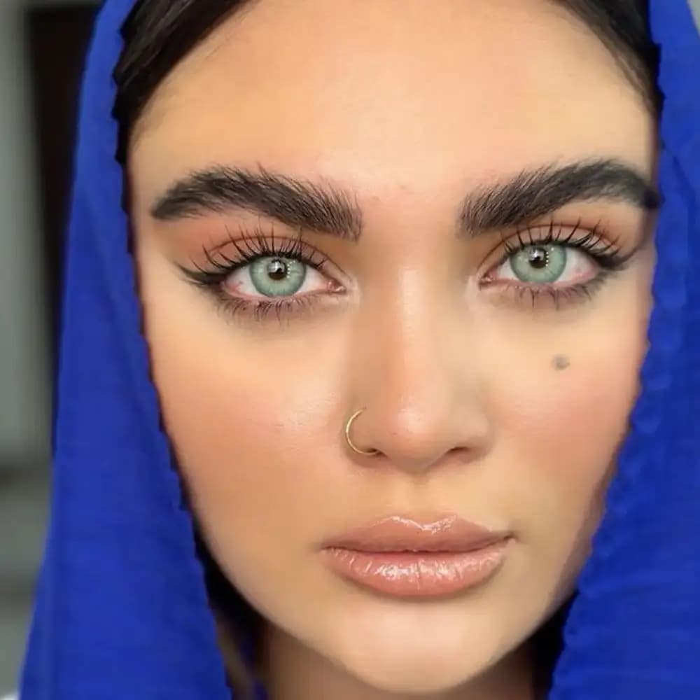 لنز یونیک باربی بلو سبز آبی مرکز عسلی دور دار — تصویر ۴