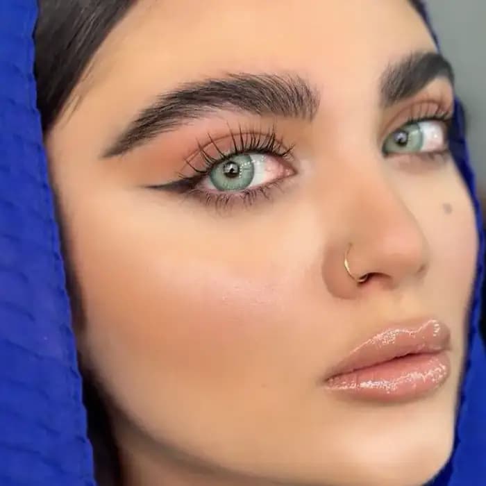 لنز یونیک باربی بلو سبز آبی مرکز عسلی دور دار — تصویر ۵