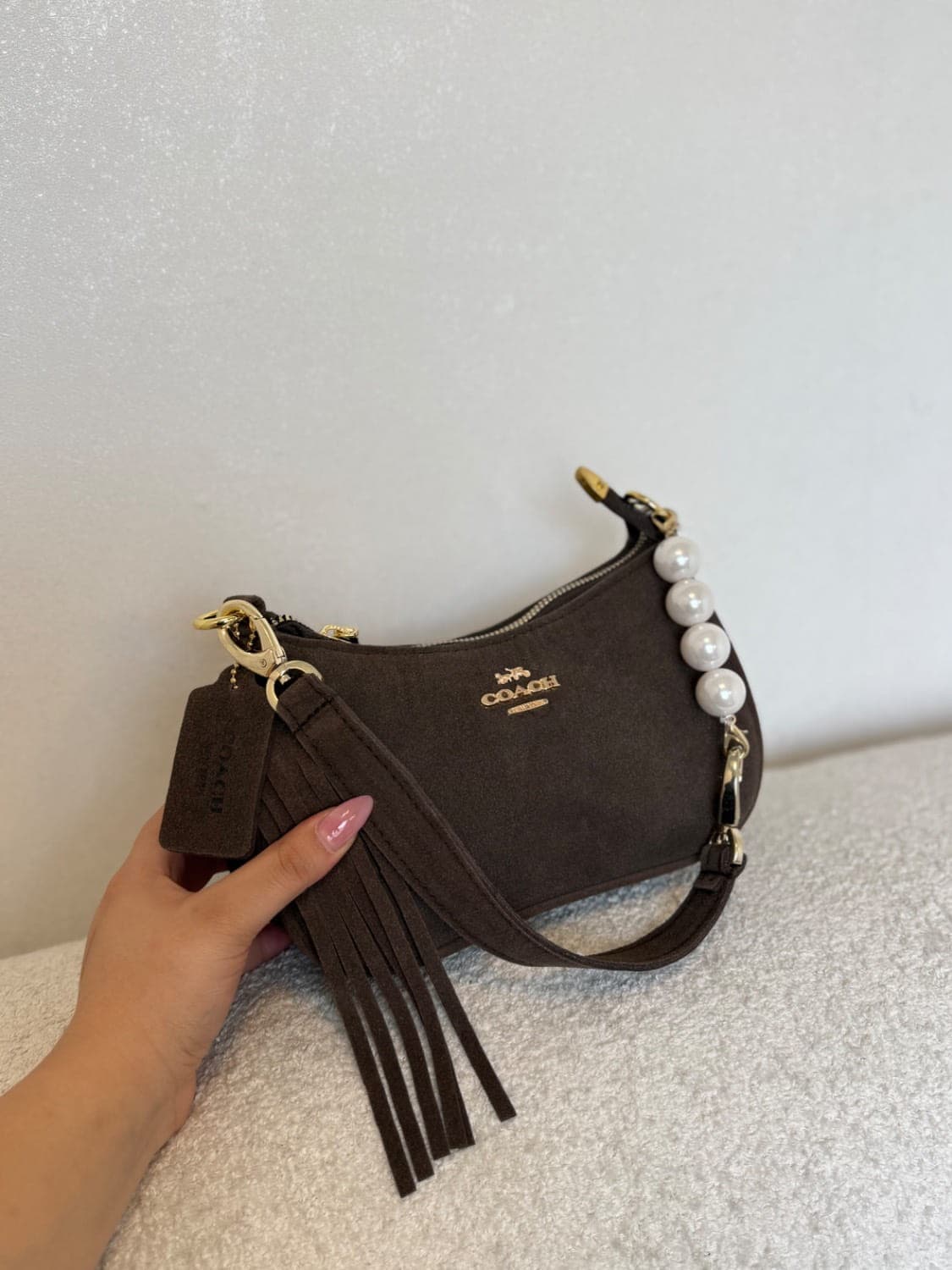 کیف زنانه کوچ دستی مهره دار — تصویر ۵