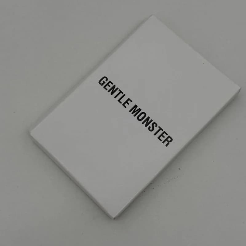 پک و جعبه عینک اورجینال جنتل مانستر Gentle Monster چرم سفید با هاردباکس — تصویر ۵