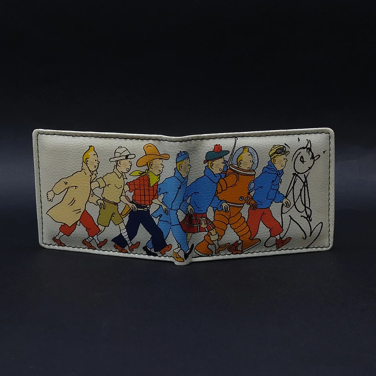 کیف پول طرح تن‌تن و شخصیت‌های ماجراجوی داستان | کیف پول چاپی کارتونی با طراحی کلاسیک و نوستالژیک — تصویر ۳