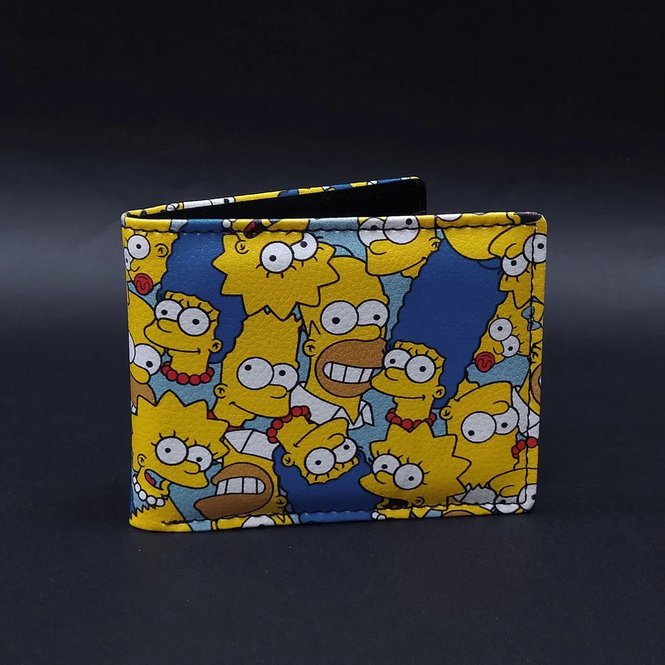 کیف پول چرم چاپی طرح سیمپسون‌ها | کیف پول چاپی کارتونی The Simpsons با طراحی رنگارنگ و فانتزی