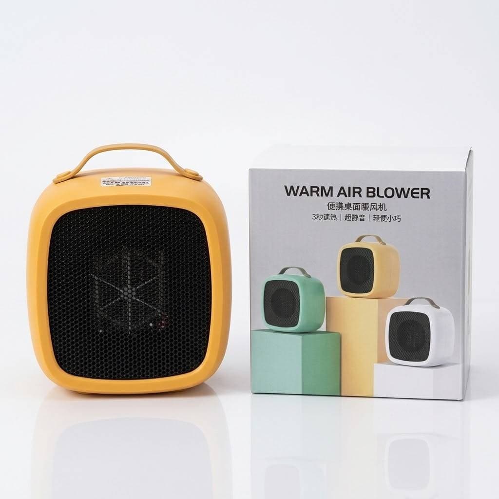 هیتر برقی رومیزی رنگی مدل warm air blower | بخاری برقی کوچک و کاربردی