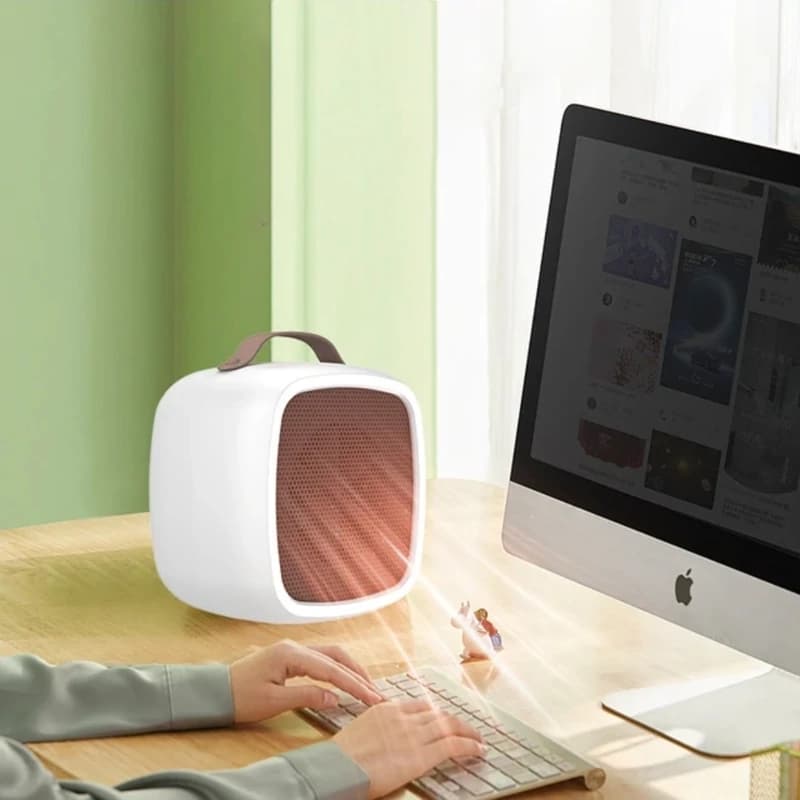 هیتر برقی رومیزی رنگی مدل warm air blower | بخاری برقی کوچک و کاربردی — تصویر ۵
