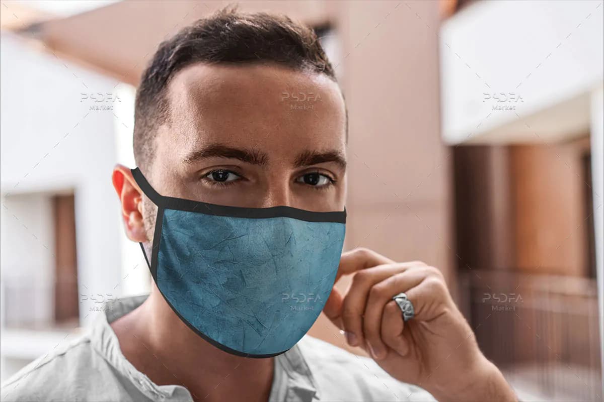 موکاپ ماسک پارچه ای روی صورت زن و مرد — تصویر ۳