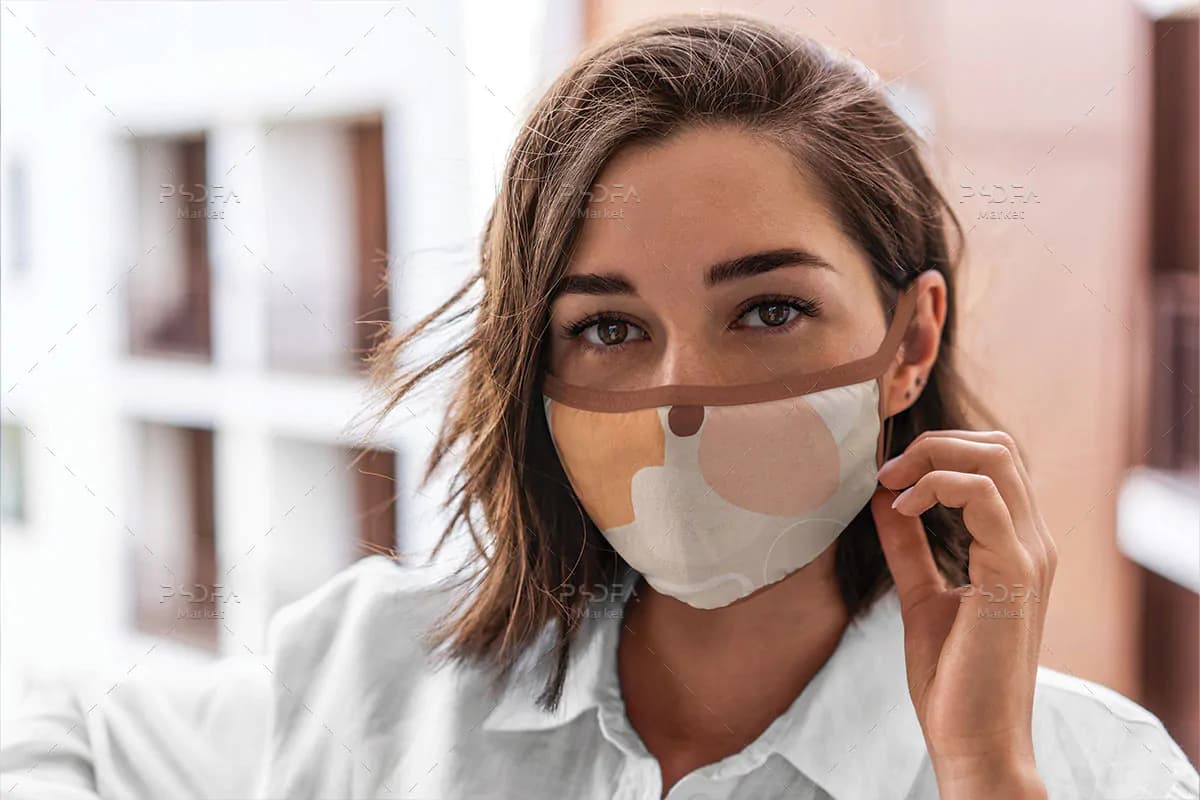 موکاپ ماسک پارچه ای روی صورت زن و مرد — تصویر ۵
