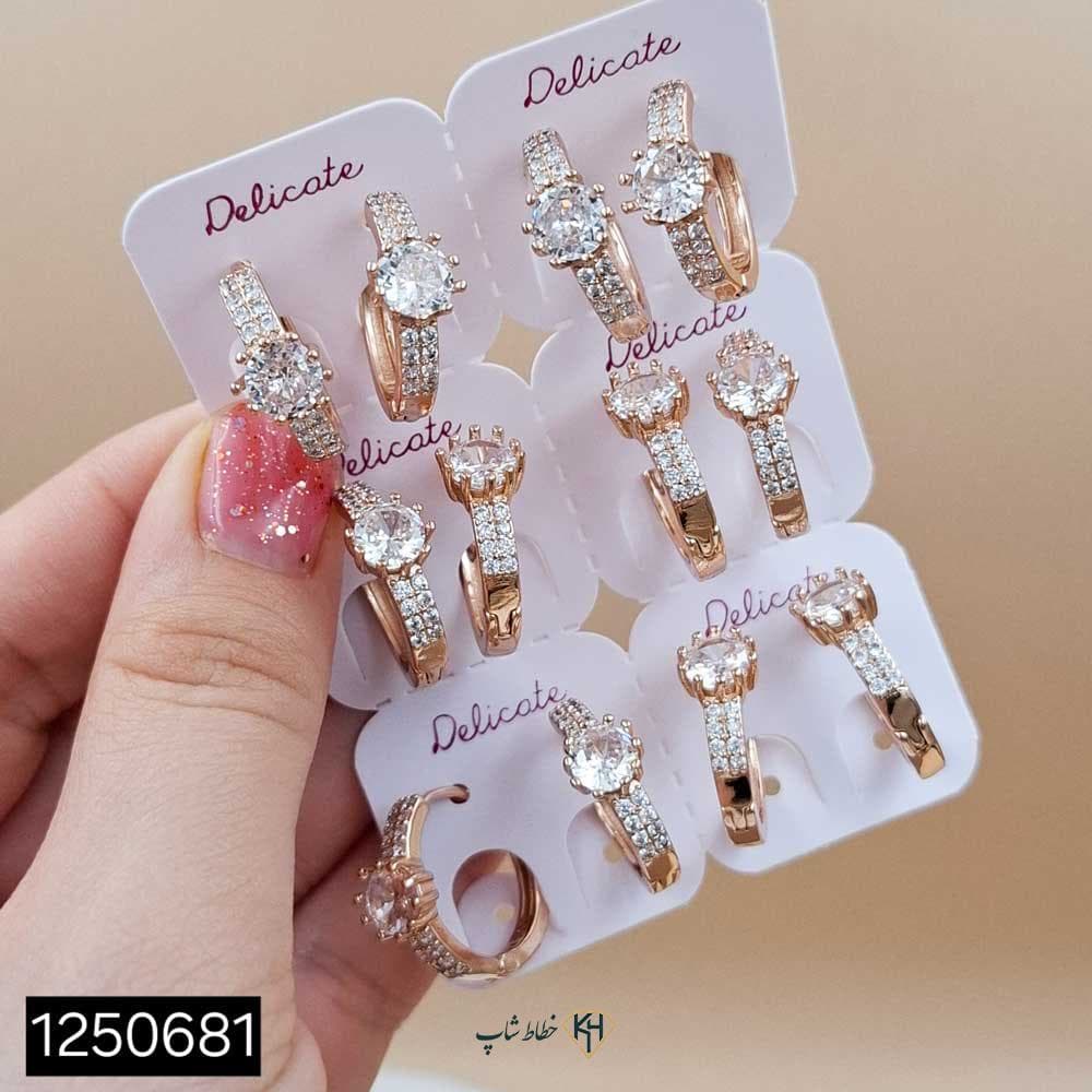 گوشواره NYH حلقه ای 2رج نگین اتمی و تک سولیتر — تصویر ۳
