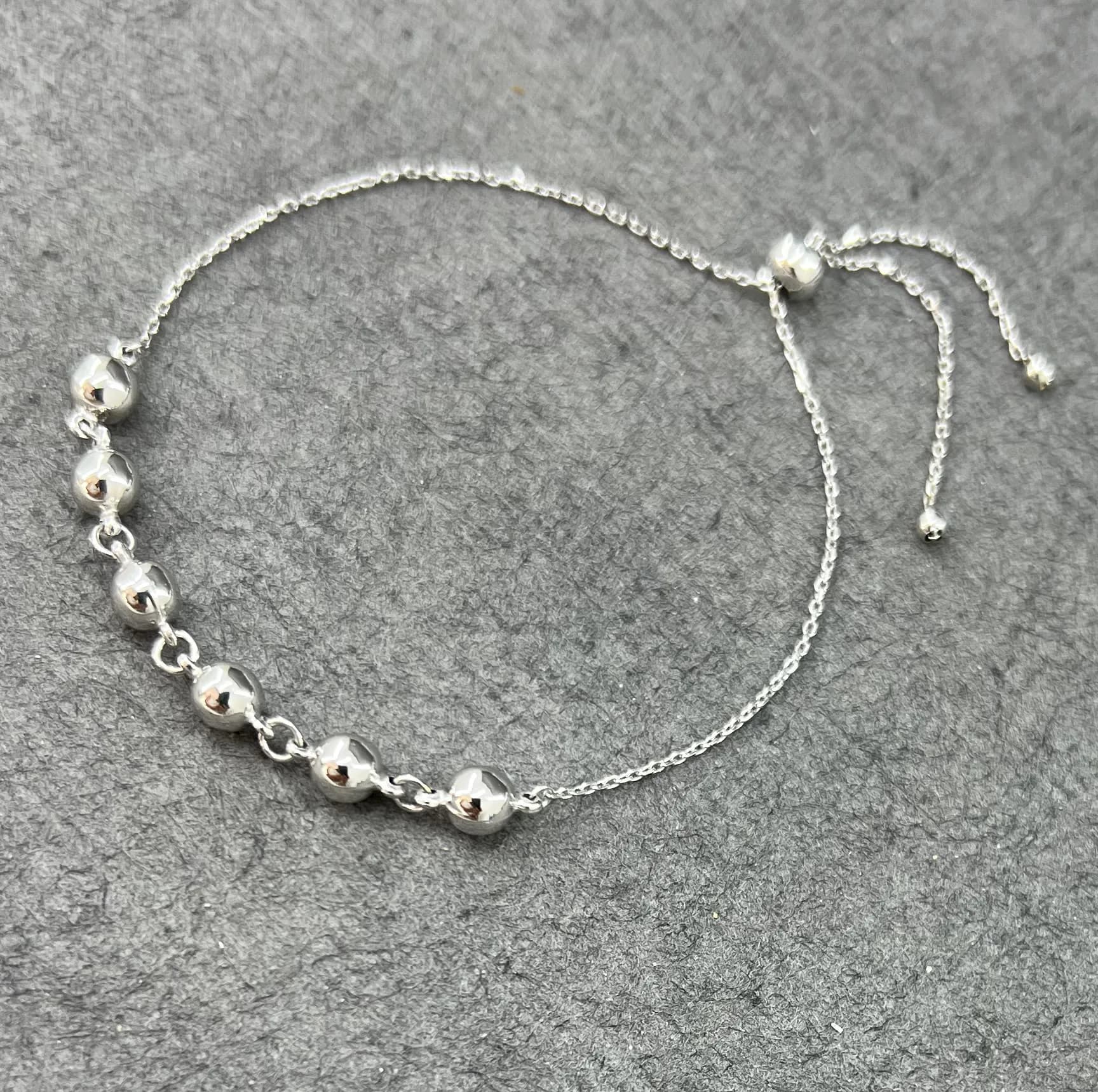 دستبند طلا 18 عیار زنانه دوست خوب مدل آسانسوری گوی کد dk081 — تصویر ۲